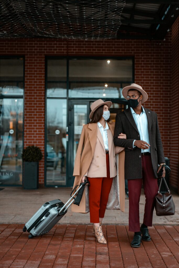 Couple Standing Outside of the Hotel
